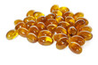 brown fish oil gel capsule pills closeup