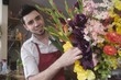 Florist works on flower arrangement