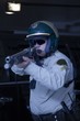 Nightwatch patrolman aiming rifle