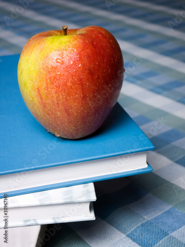 Photo: Books and apple Books and apple