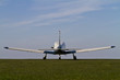 Light aircraft on a grass airfield
