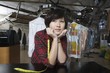 Woman working in the laundrette
