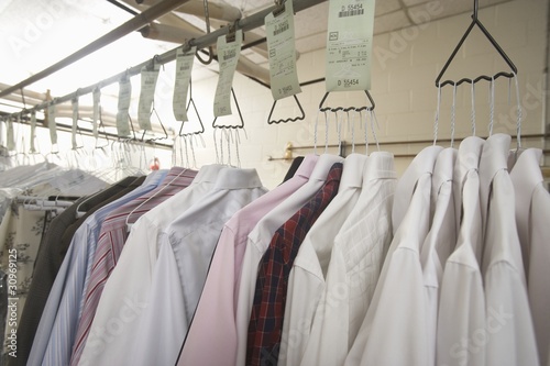 Photo: Clothes hanging in the laundrette Clothes hanging in the laundrette