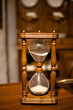 Photo: Vintage wooden sandglass Vintage wooden sandglass