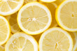 Background with cut lemons Background with cut lemons