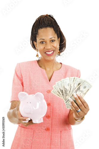 Photo: Beautiful Woman Saving Money Beautiful Woman Saving Money