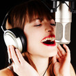 young artist woman recording in a studio