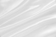 Smooth elegant white silk as wedding background Smooth elegant white silk as wedding background