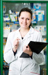 Foto: Pharmacy chemist woman in drugstore Pharmacy chemist woman in drugstore