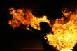 Burning stunt man showing a fire show