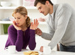 Photo: Couple Having Argument At Home Couple Having Argument At Home