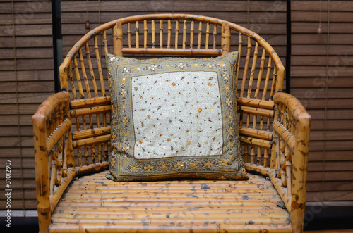 Photo: Pillow on a Wicker Chair Pillow on a Wicker Chair