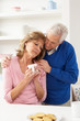 Senior Man Consoling Wife