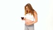Video: Pregnant woman drinking a glass of red wine Pregnant woman drinking a glass of red wine