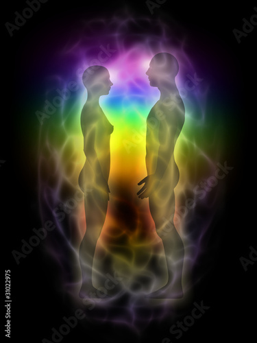Illustration: Woman and man silhouette with aura, chakras, energy - profile Woman and man silhouette with aura, chakras, energy - profile
