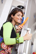 Woman open the refrigerator door