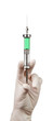 Syringe with a medicine in a hand