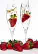Strawberries Splashing into a glass of Champagne Strawberries Splashing into a glass of Champagne