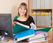 HAppy businesswoman reading  documents