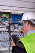 Photo: Electrician during measurment Electrician during measurment