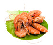 Fresh shrimp on lettuce leaf, isolated on a white background Fresh shrimp on lettuce leaf, isolated on a white background