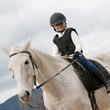 Horse riding - little girl is riding a horse