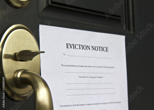Photo: Eviction Notice Letter on Front Door Eviction Notice Letter on Front Door