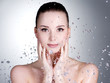 Drops of water around the beautiful woman face