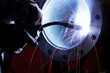 worker weld metal in factory and sparks