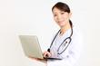 japanese female doctor with laptop computer smiles/パソコンを持つ女性医師