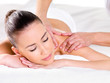 Woman having massage on shoulder Woman having massage on shoulder