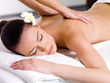 Beautiful woman having relaxing massage in spa salon Beautiful woman having relaxing massage in spa salon