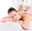Heathy massage for young woman with aromatic oils Heathy massage for young woman with aromatic oils