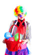 Girl in bright carnival costumes with a basket of balloons