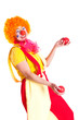 girl dressed as a clown juggling