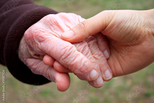 Photo: Senior and Young Women's Hands Senior and Young Women's Hands
