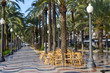 Mediterranean alley and street cafe tables