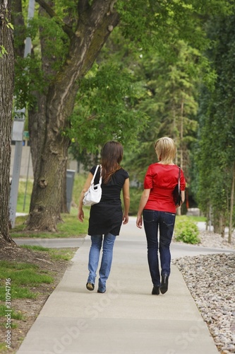 Photo: Friends Walking On The Sidewalk Friends Walking On The Sidewalk