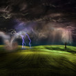 Tornado in stormy landscape