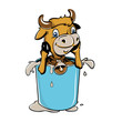 Little cow in a glass of milk