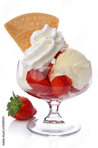 Photo: Ice cream with strawberries and whipped cream Ice cream with strawberries and whipped cream