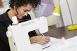 Fashion designer with sewing machine