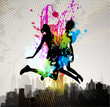 Girls jumping over city.