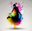 Girl jumping over ink splash background.