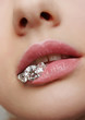 Beautiful female lips closeup with luxury diamonds in it