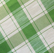 Beige and green linen fabric as background Beige and green linen fabric as background