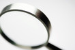 Magnifying glass, close-up, cropped