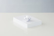 Paper ball on top of stacked office paper