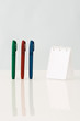Pens and spiral notebook, close-up
