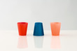 Three colored cups